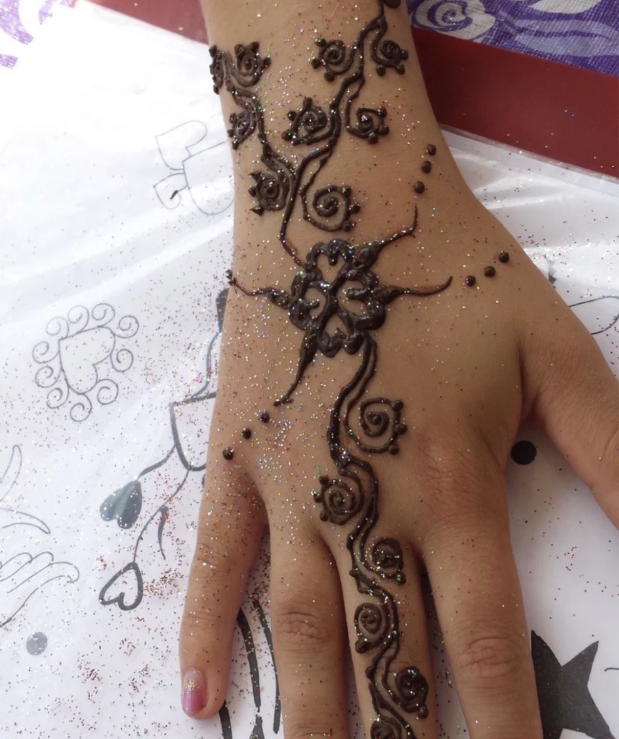 Glitter Henna Tattoo Application