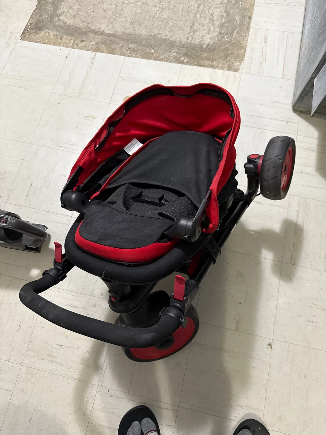 Red and Black Stroller Tricycle