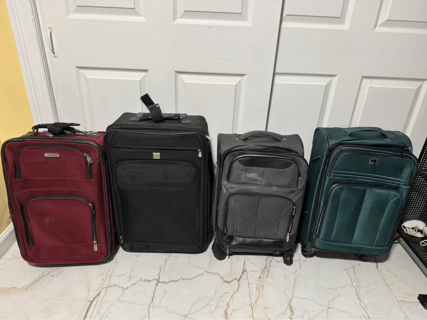 Medium-sized suitcases with wheels. $12 each or best offer.
