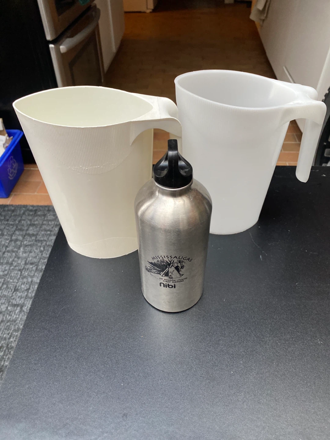 2 milk Pitchers & Water Bottle