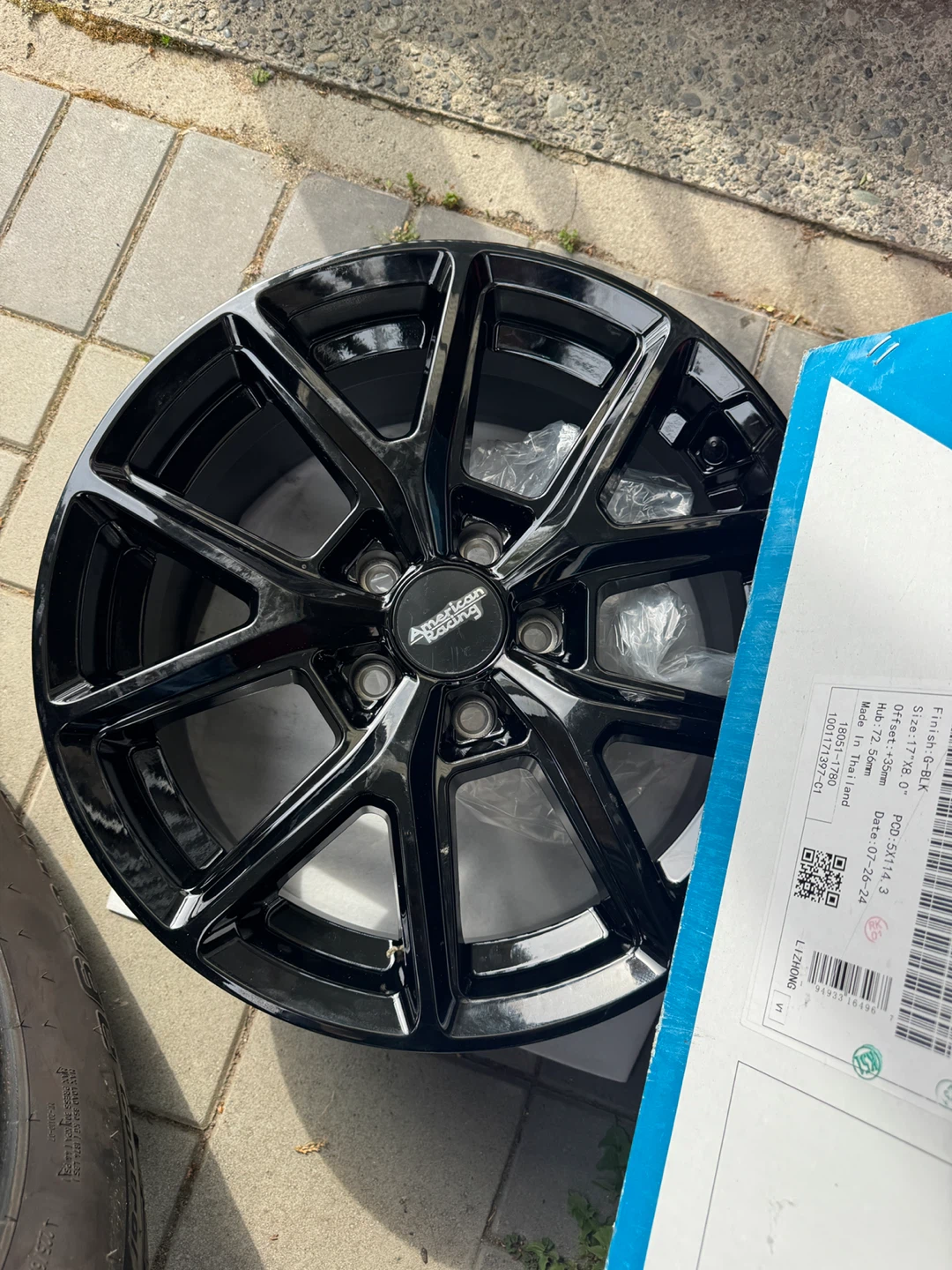 American Racing Black Alloy Wheel and Tire
