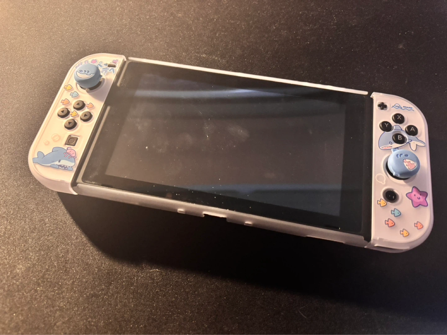 Nintendo Switch 1 With thumb grips, case. - photo 2