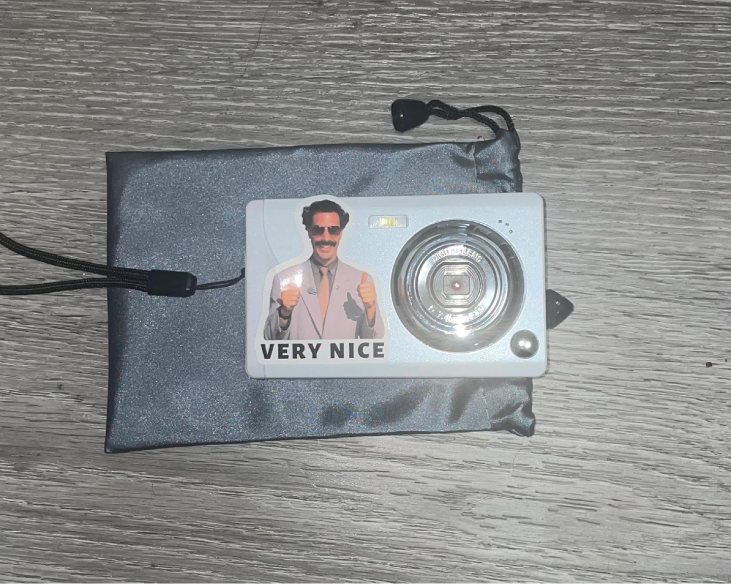 White Digital Camera with Borat Sticker