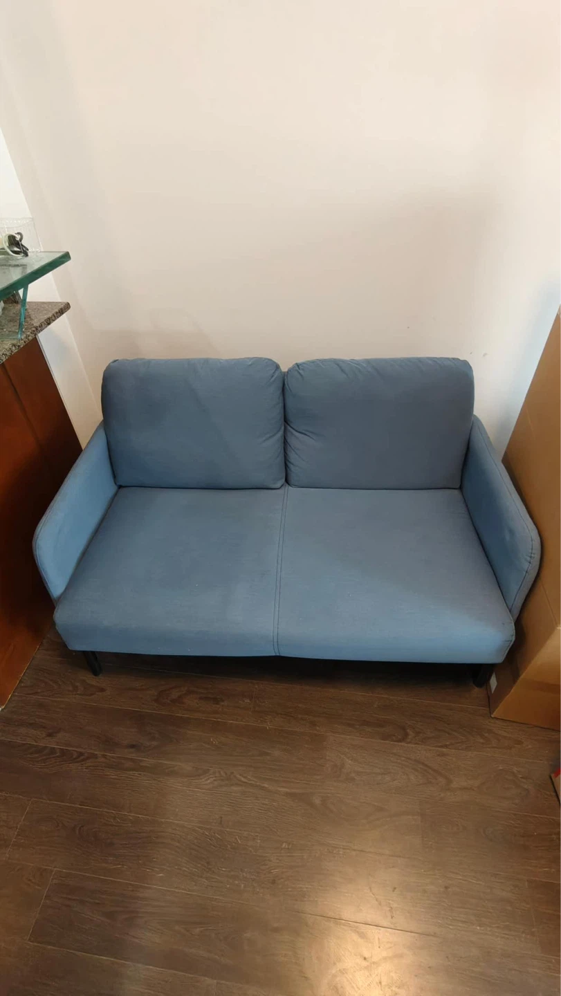 Blue loveseat couch