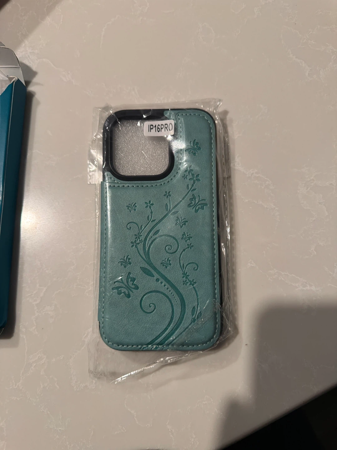 iPhone 16 Pro Case - Teal Floral Embossed