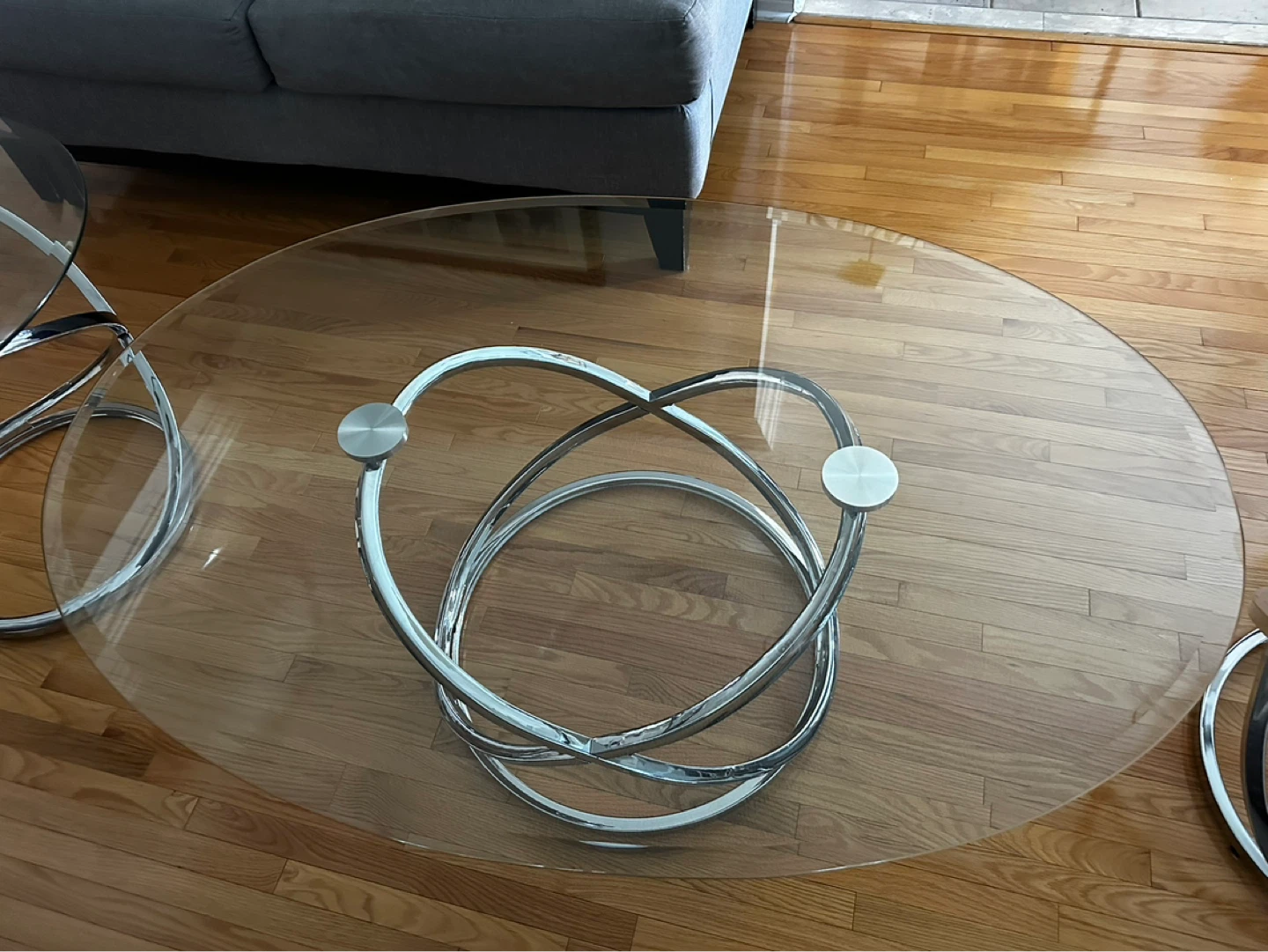 Oval Glass Top Coffee Table with Chrome Base