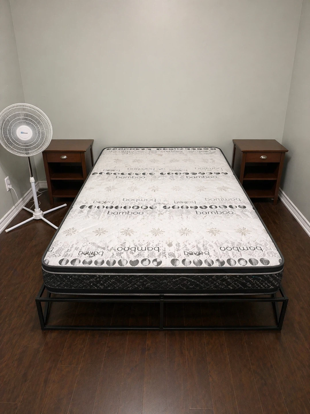 Queen mattress and standing fan
