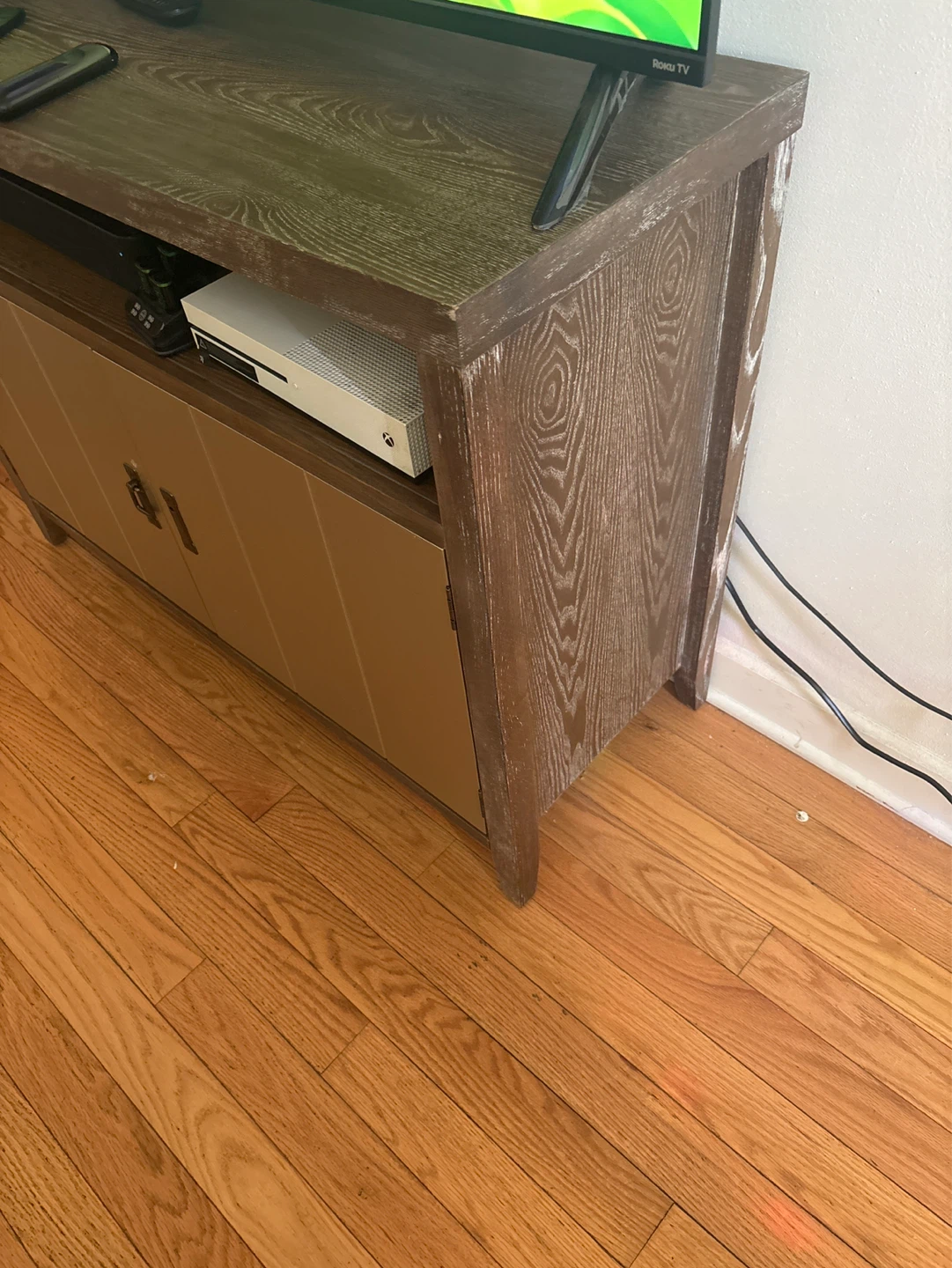 Wood tv stand with metal cabinet doors and shelves inside - photo 4