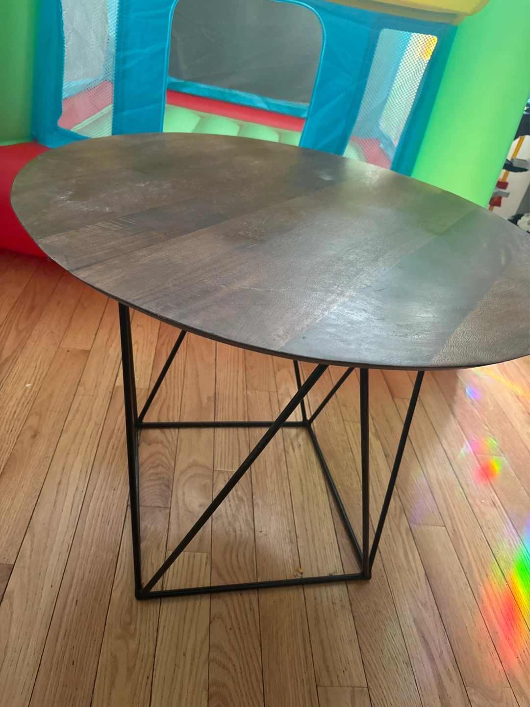 Small round wood accent table