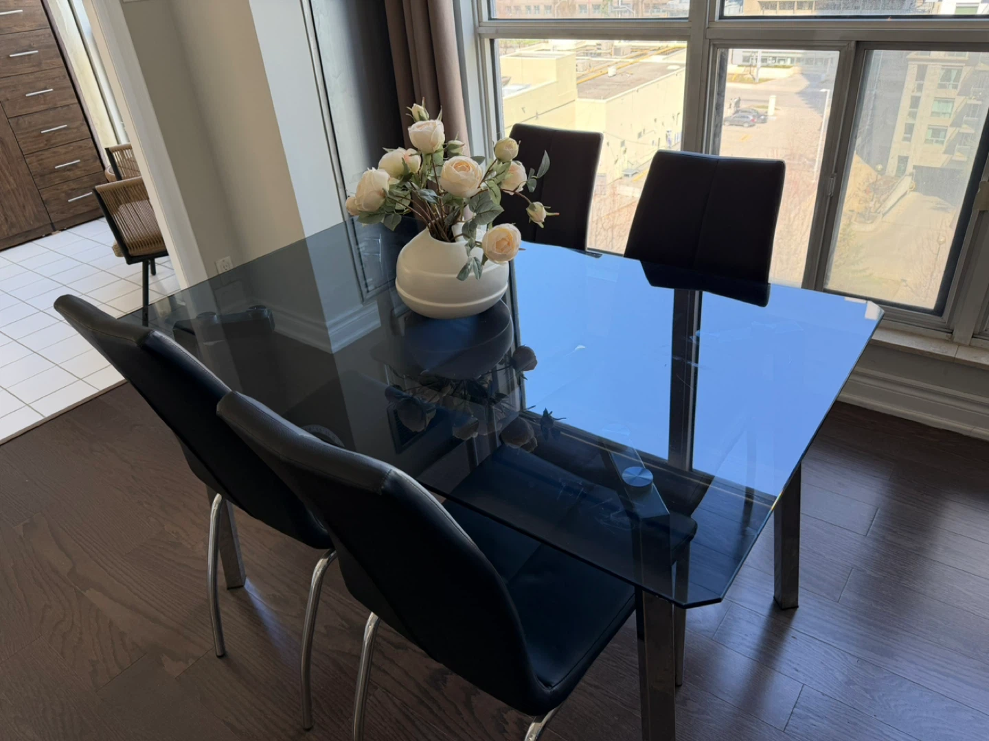 Glass Top Dining Table with 4 Black Chairs