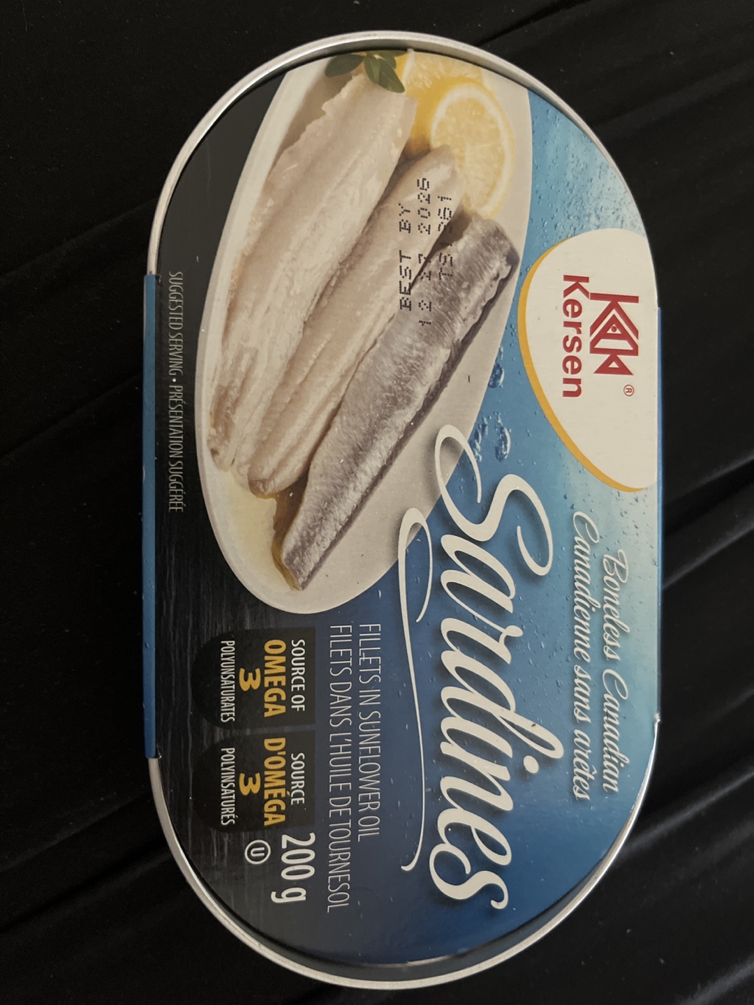 7 cans of kersen sardines; made in Canada.