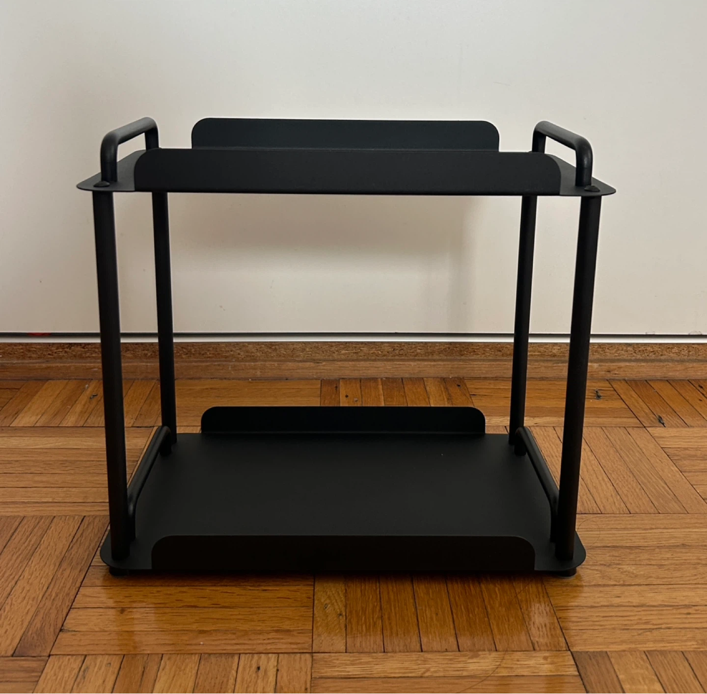 Black metal two-tier shelf