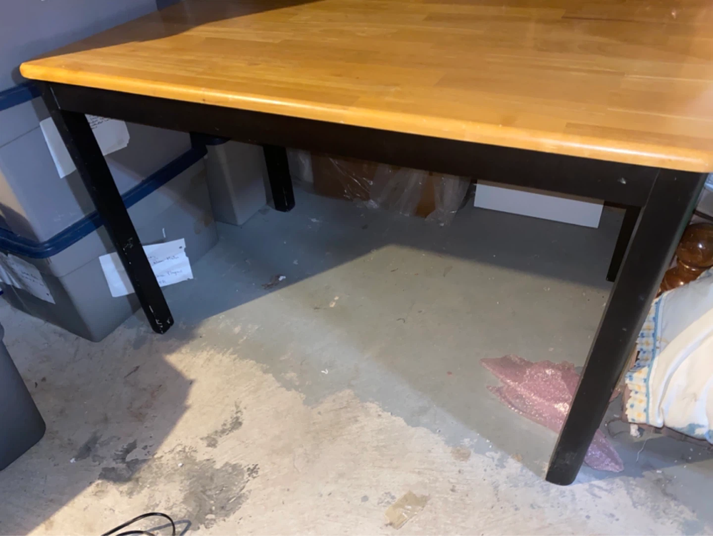 4 black metal chairs with padded seats