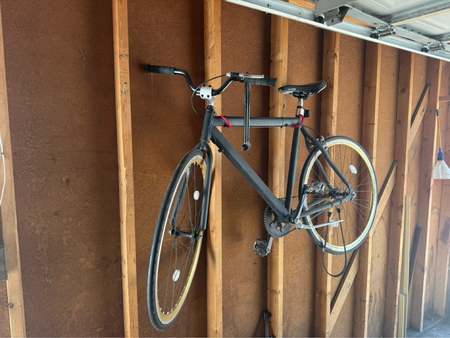 Black Bicycle with Gold Rims