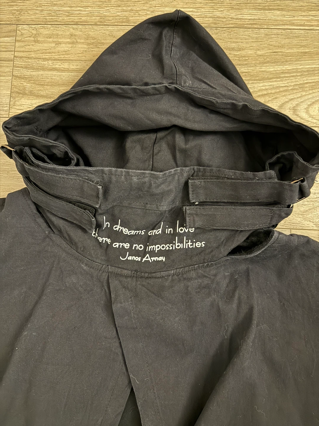 Black hooded sweatshirt with unique layered front design