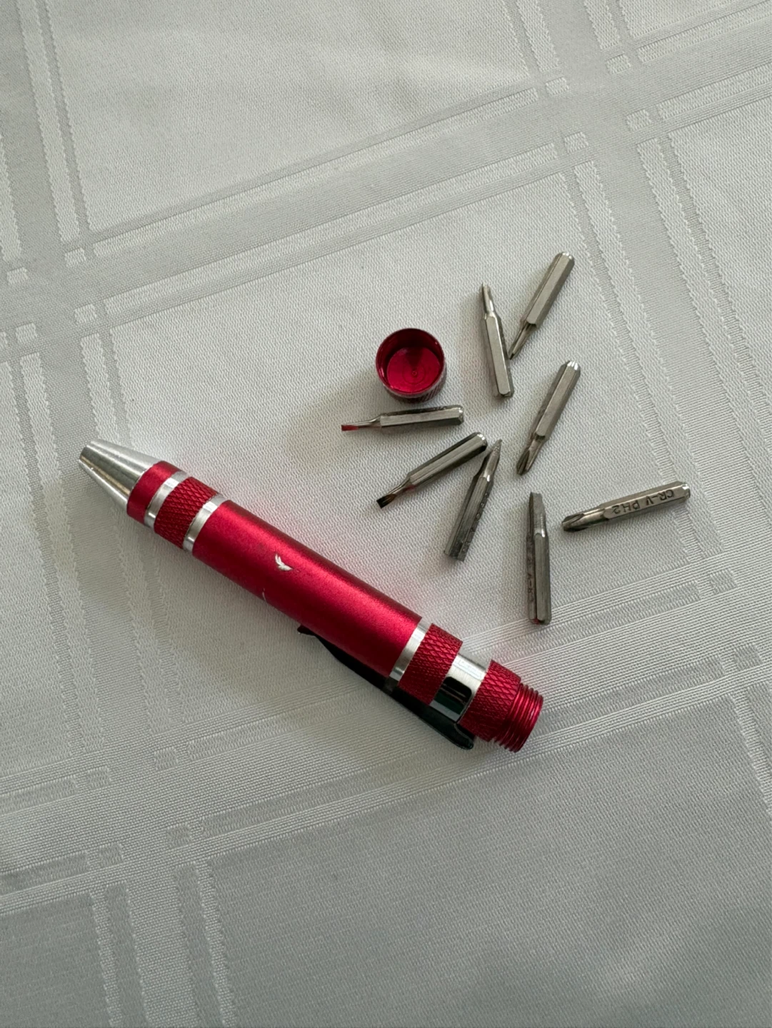 Red Multi-Bit Screwdriver with Screw Bits