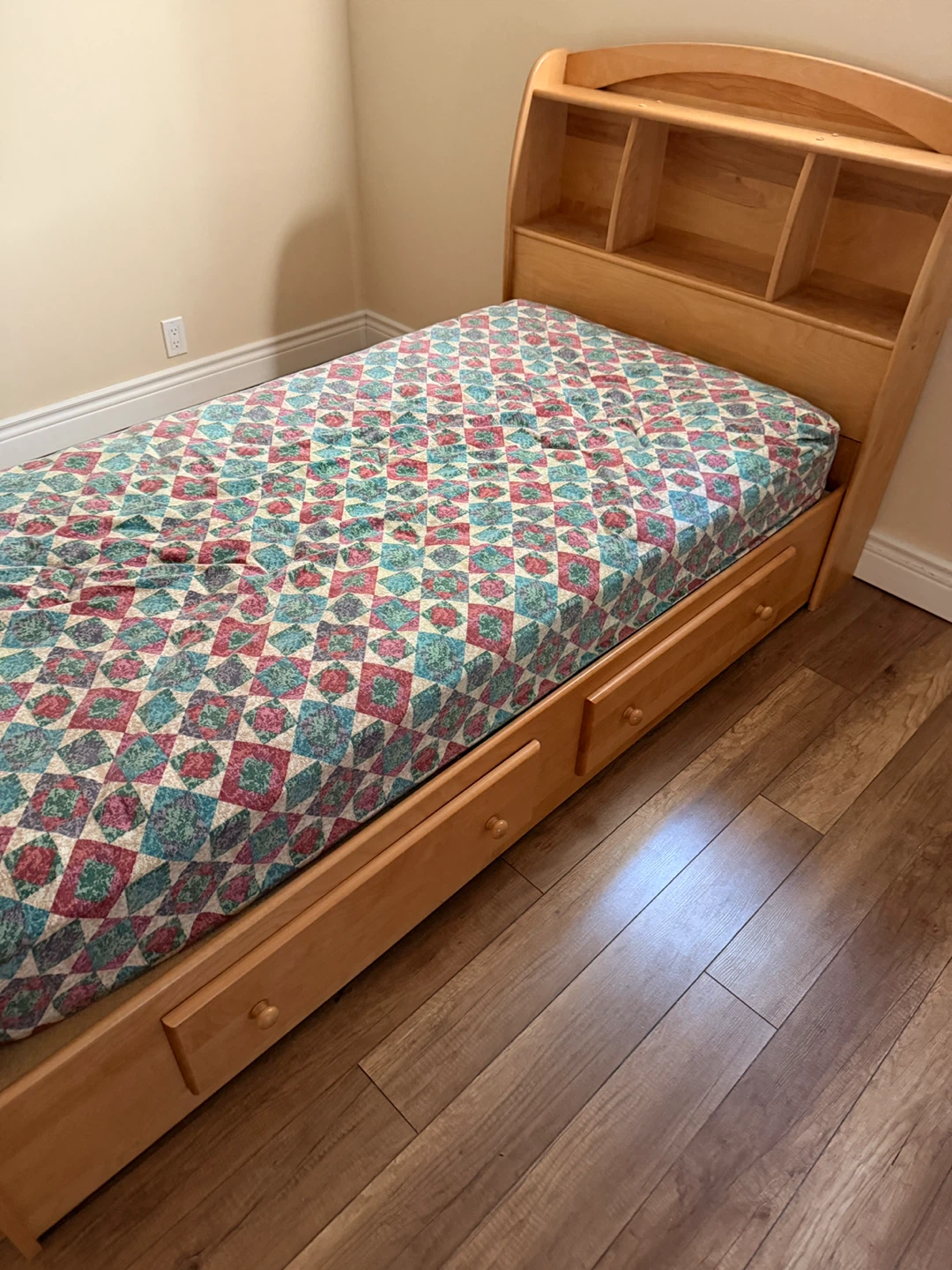 Twin size bed with headboard and storage drawers