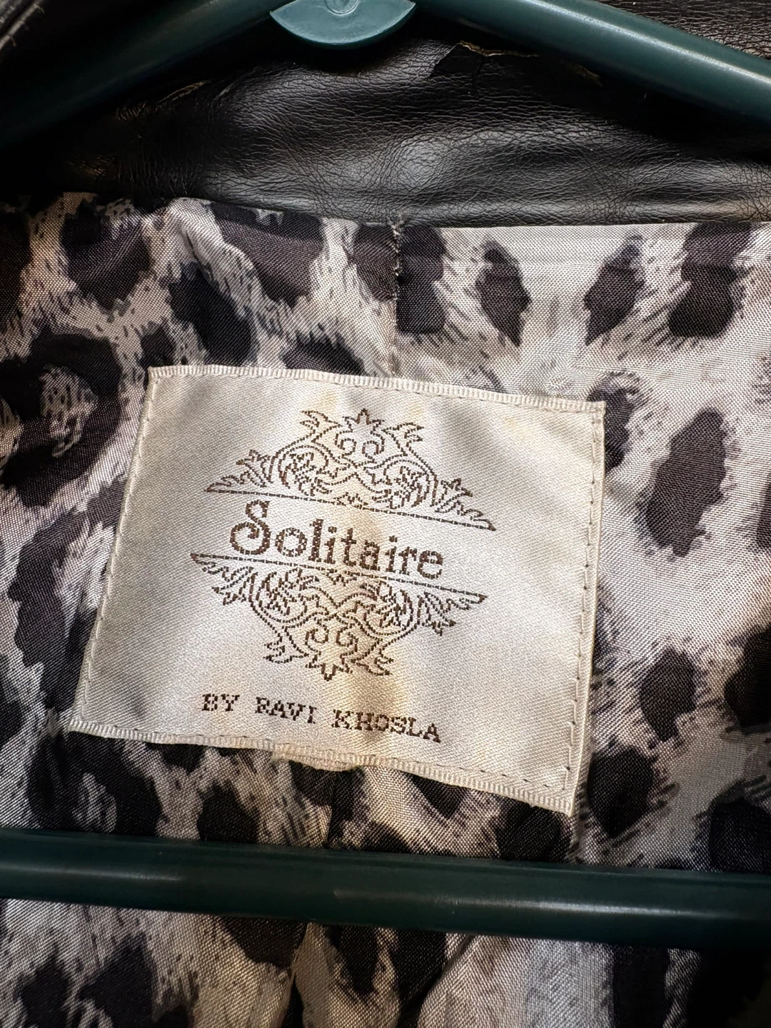 Solitaire Faux Leather Jacket with Leopard Print Lining