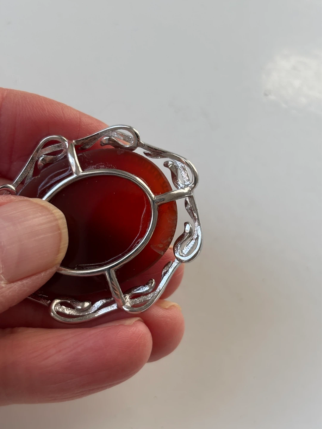 Carved Carnelian Pendant with Silver-Tone Setting