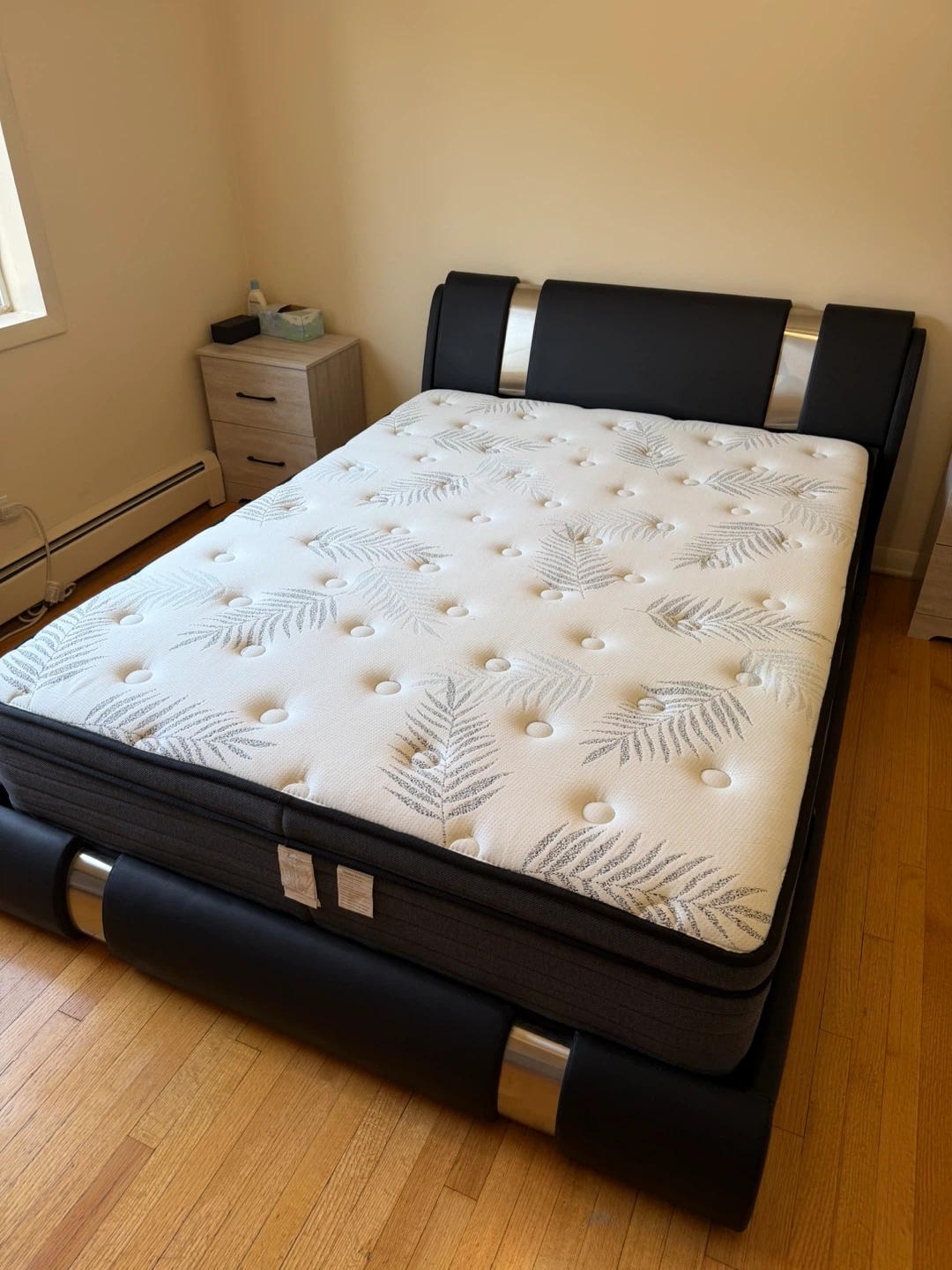Mattress with Black Bed Frame