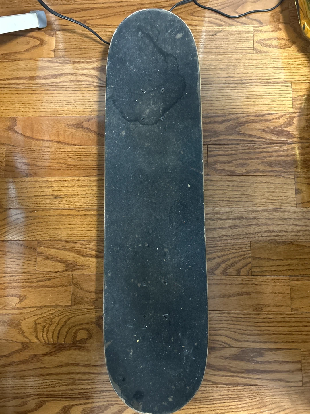 Skateboard with Skull Graphic