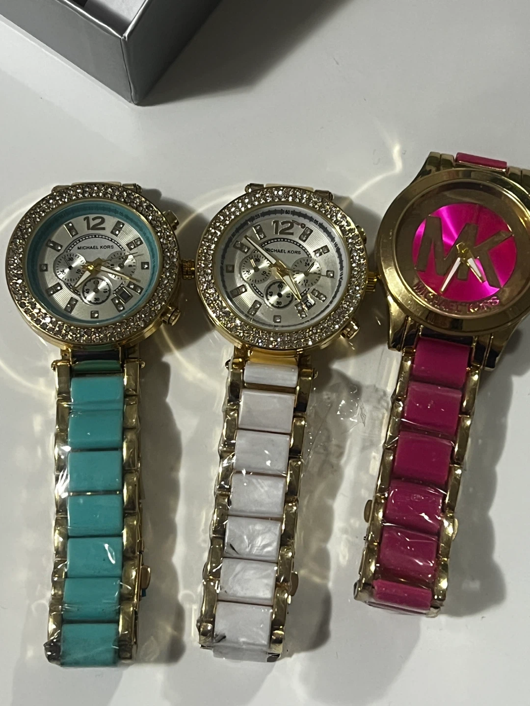 Three Michael Kors Women's Watches (Pink, White, Teal)