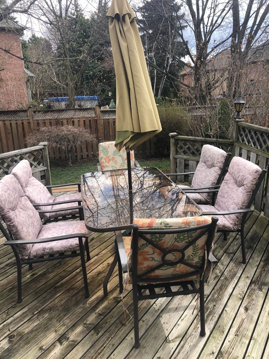 Patio Dining Set with Glass Table and Cushioned Chairs