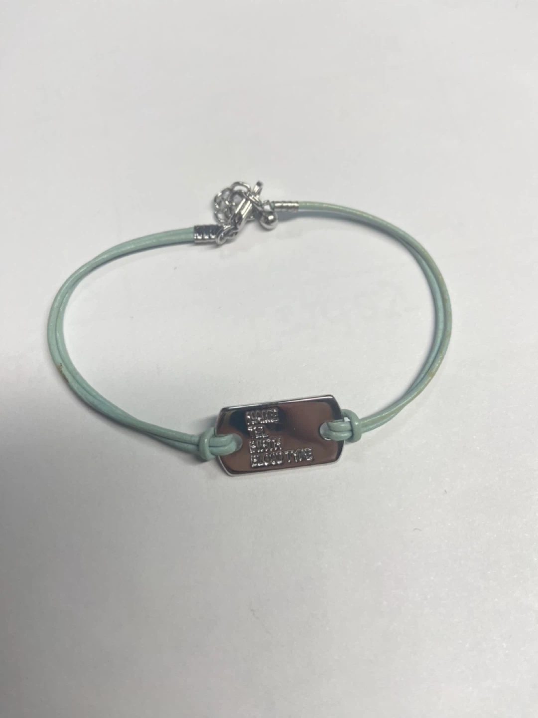 Light Blue Cord Bracelet with Silver Tag