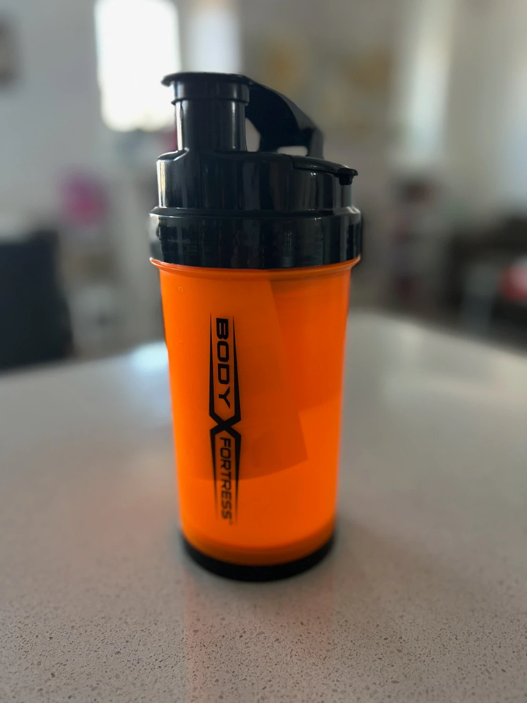 YOUR BODY. YOUR FORTRESS. Orange Shaker Bottle
