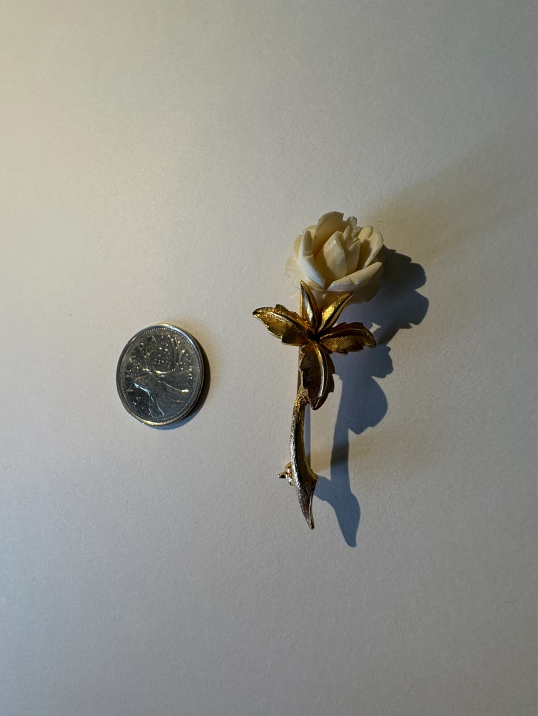 Gold tone rose flower brooch