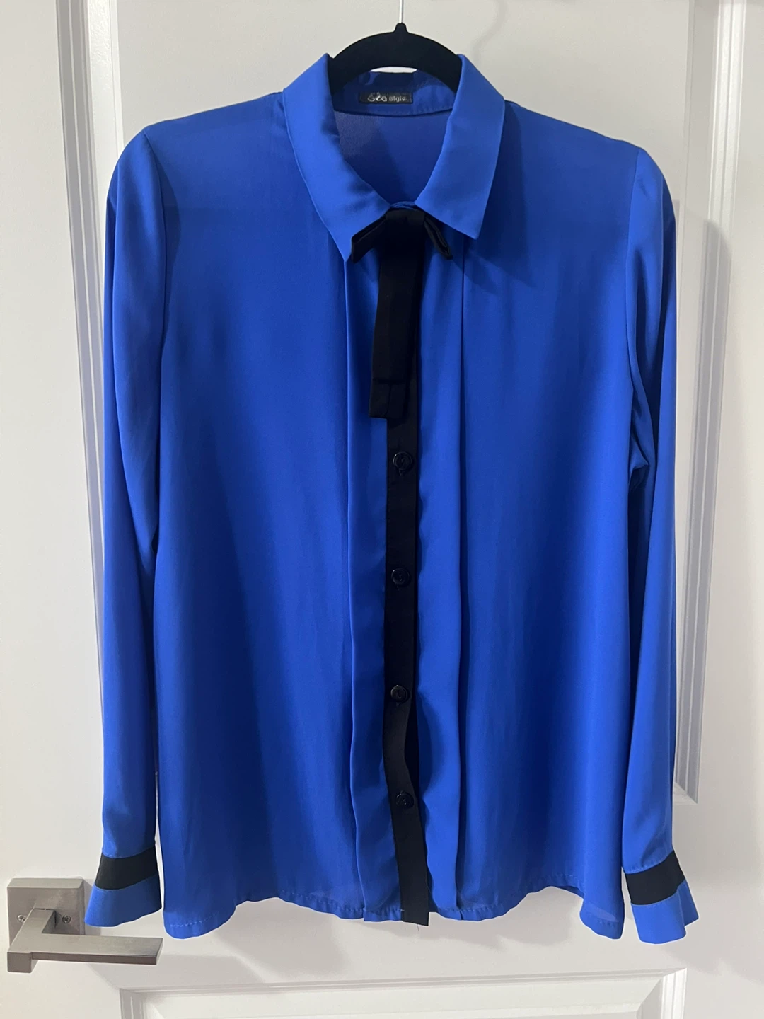Stylish Women's Blouse with Black Bow Detail