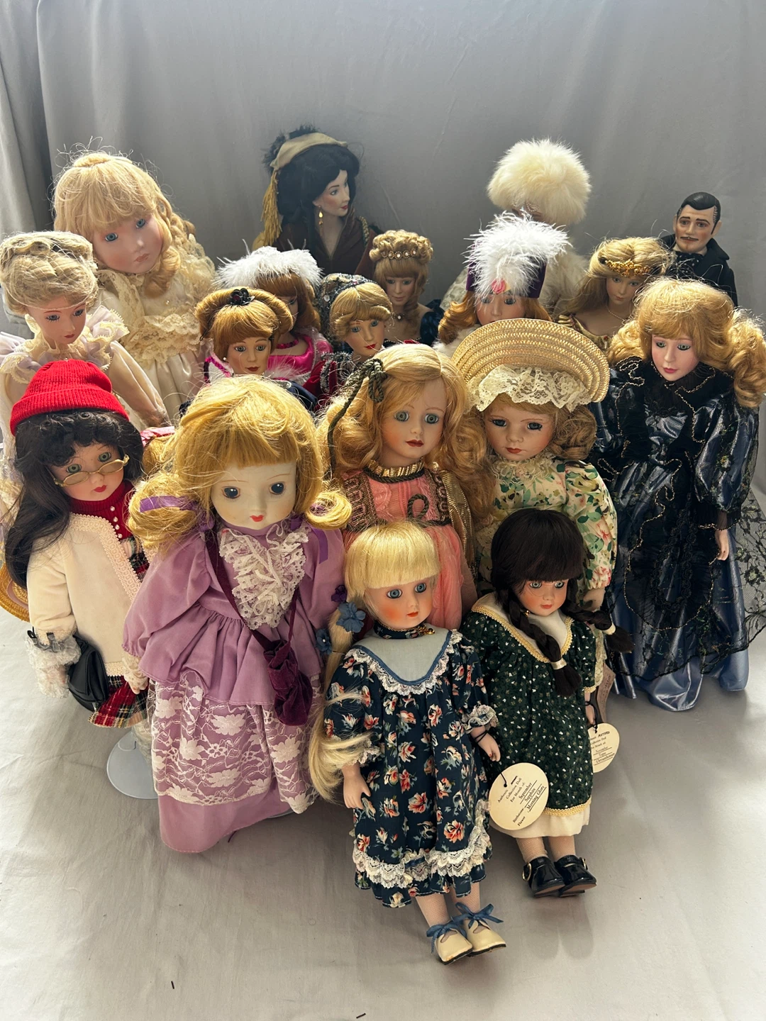 Collection of 21 Porcelain Dolls