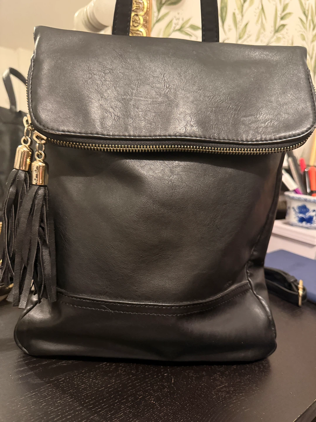 Black Faux Leather Foldover Backpack with Tassel