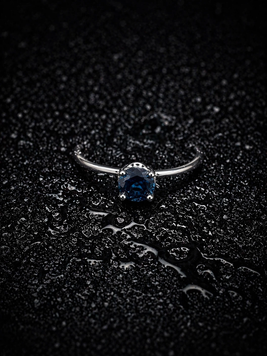 Silver ring with London Blue Topaz