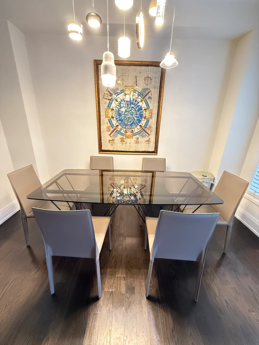 Glass Top Dining Table with Unique Metal Legs