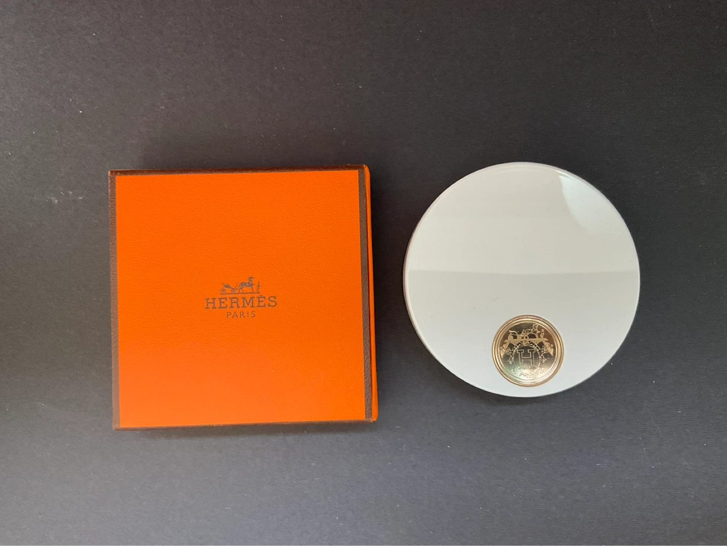 Hermes powder and lipstick.