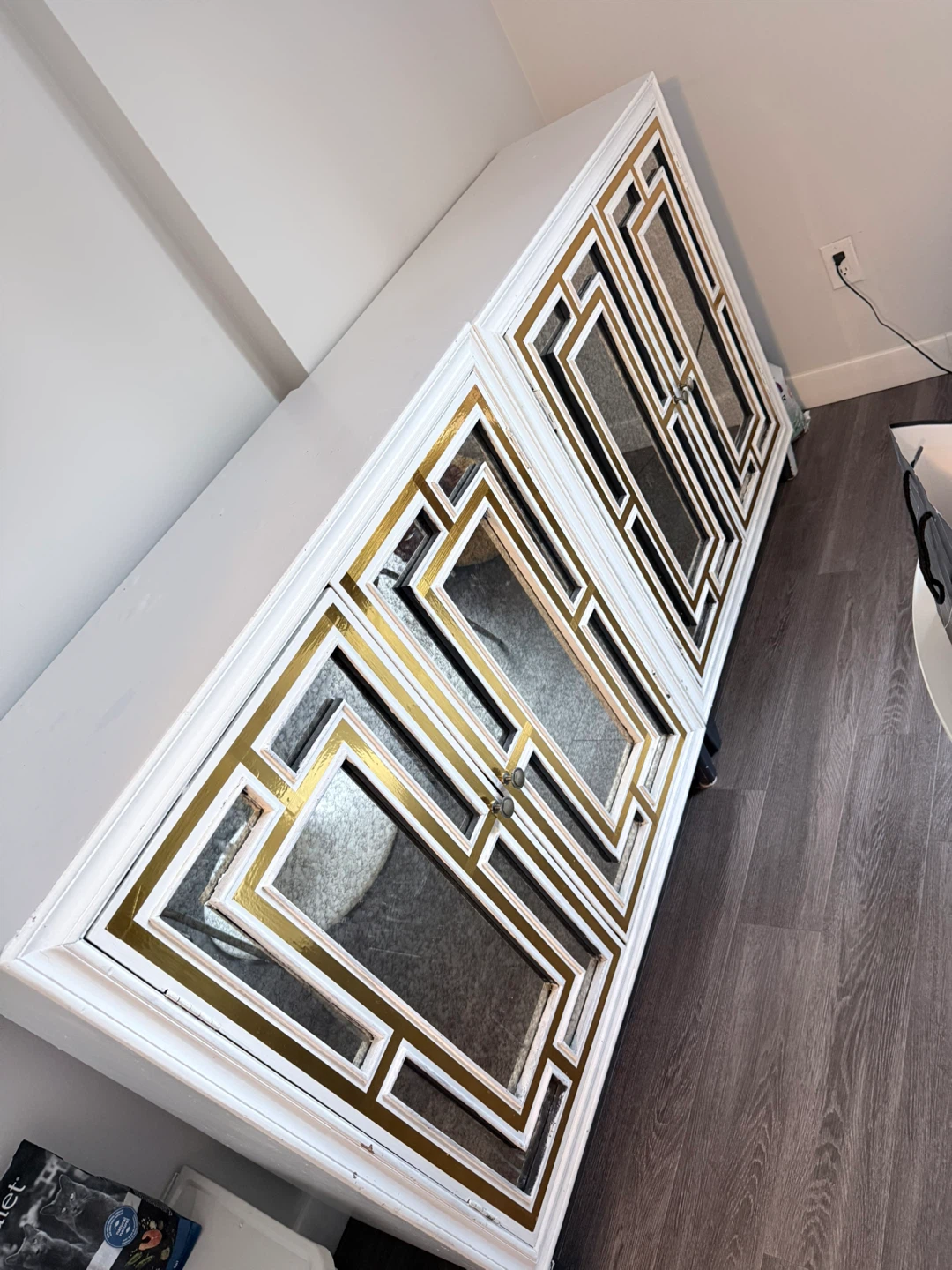 White cabinets with Geometric Mirror Inlay