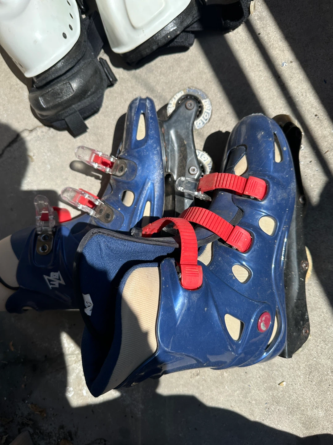 Blue Rollerblades with Red Straps