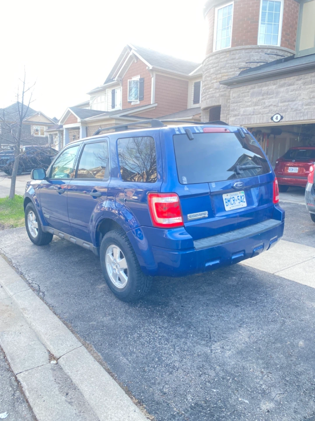 Blue Ford Escape SUV - photo 3