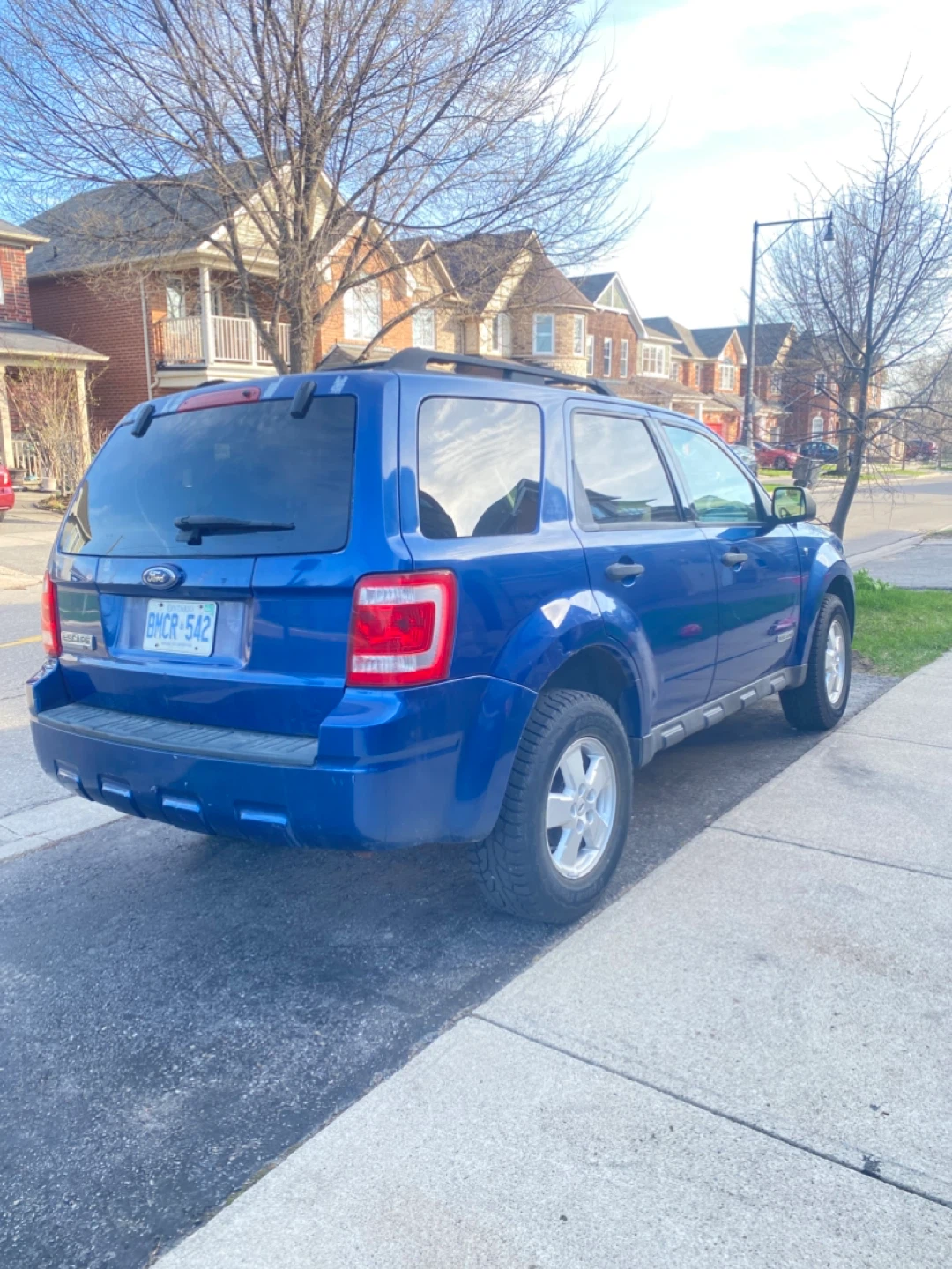 Blue Ford Escape SUV - photo 4