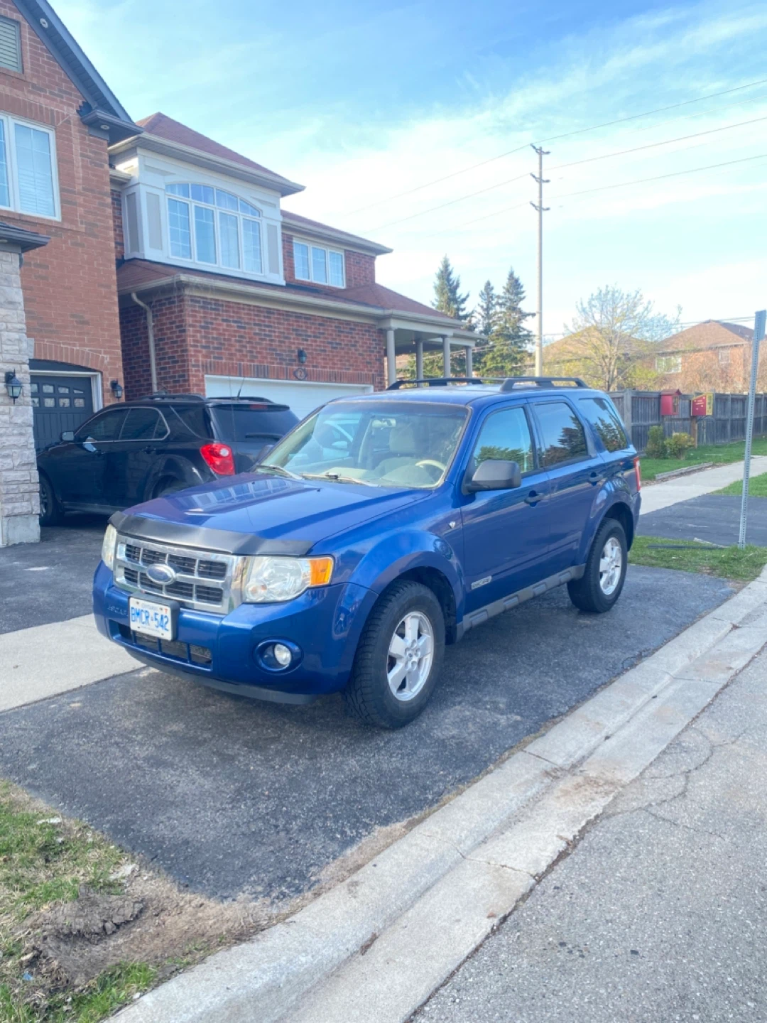 Blue Ford Escape SUV - photo 2