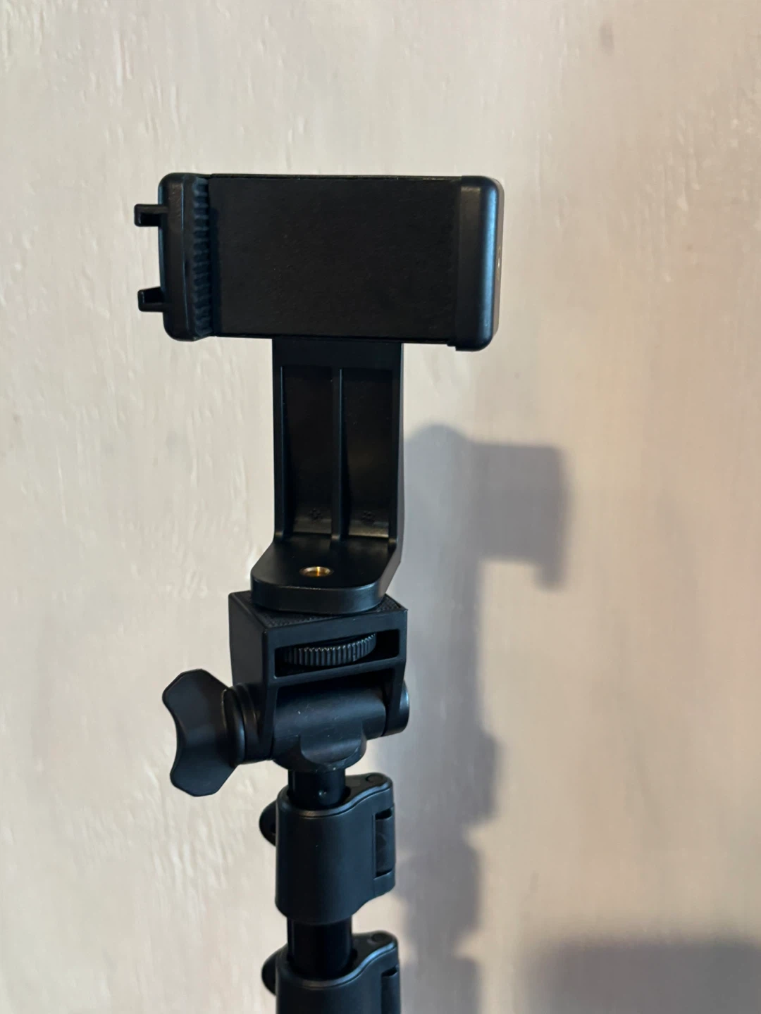 Black Tripod with adjustable Phone Mount