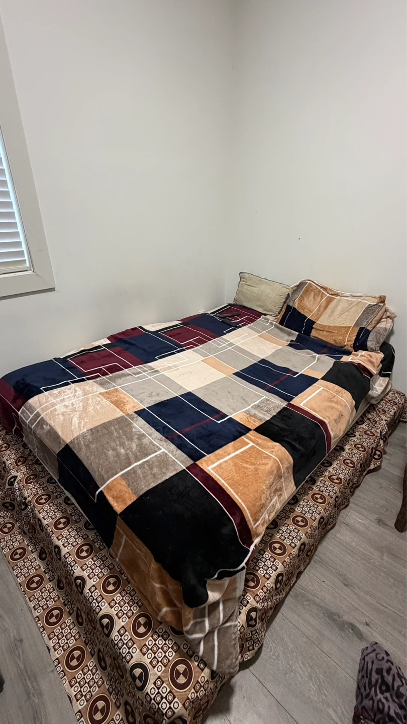 Queen Size Bed with Comforter and Pillows