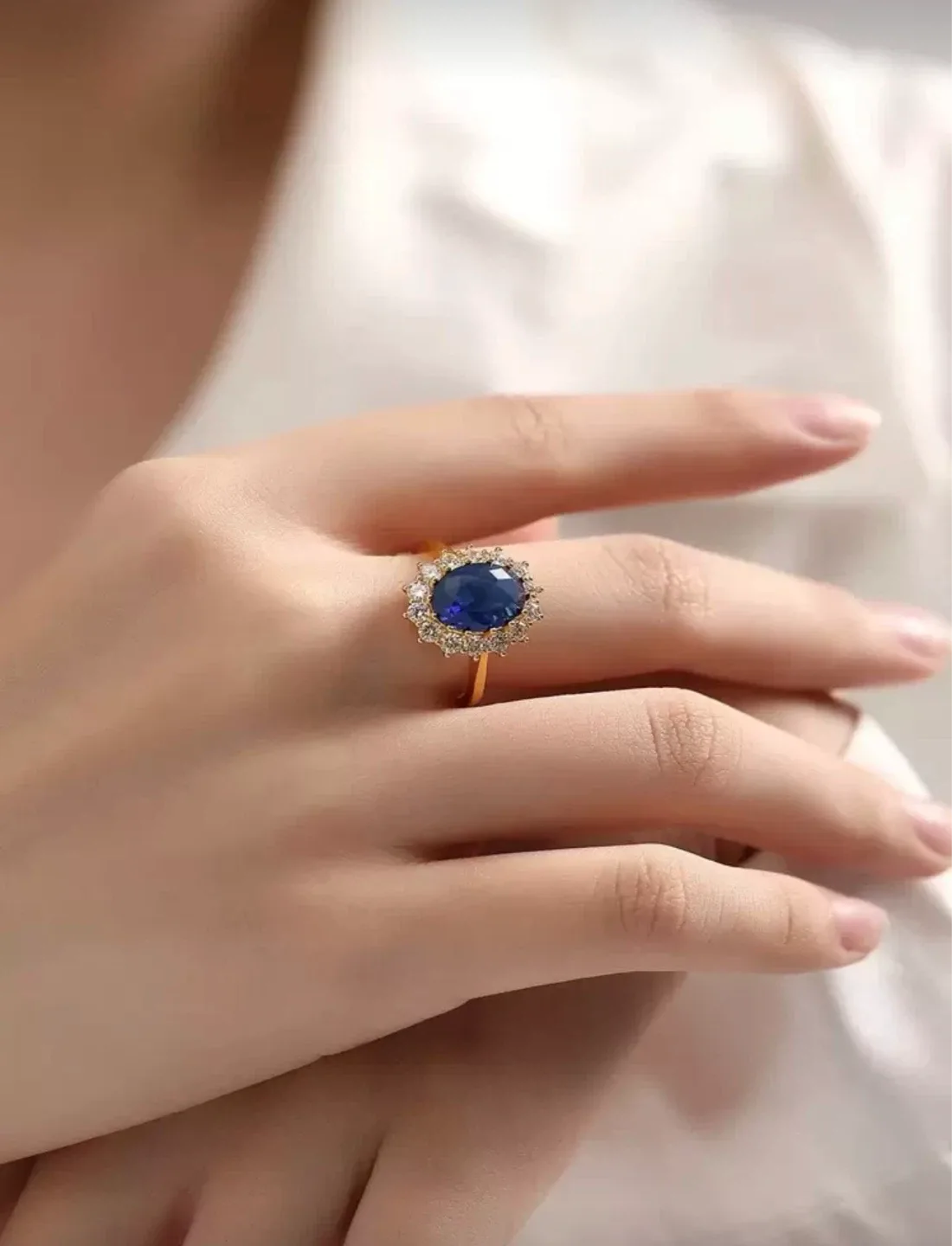 Gold-tone Ring with Blue Oval Stone and Clear Accent Stones - photo 2