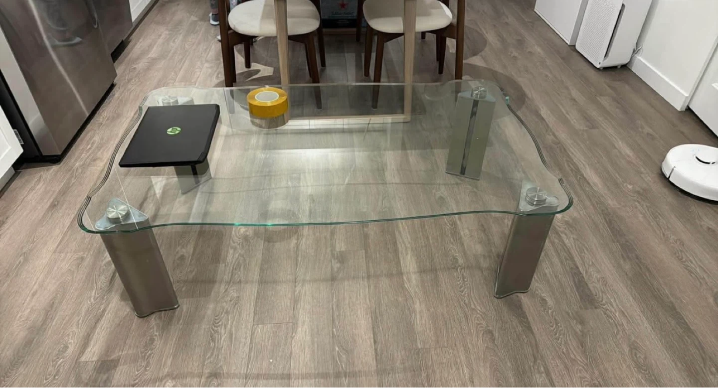 Glass coffee table with metal legs
