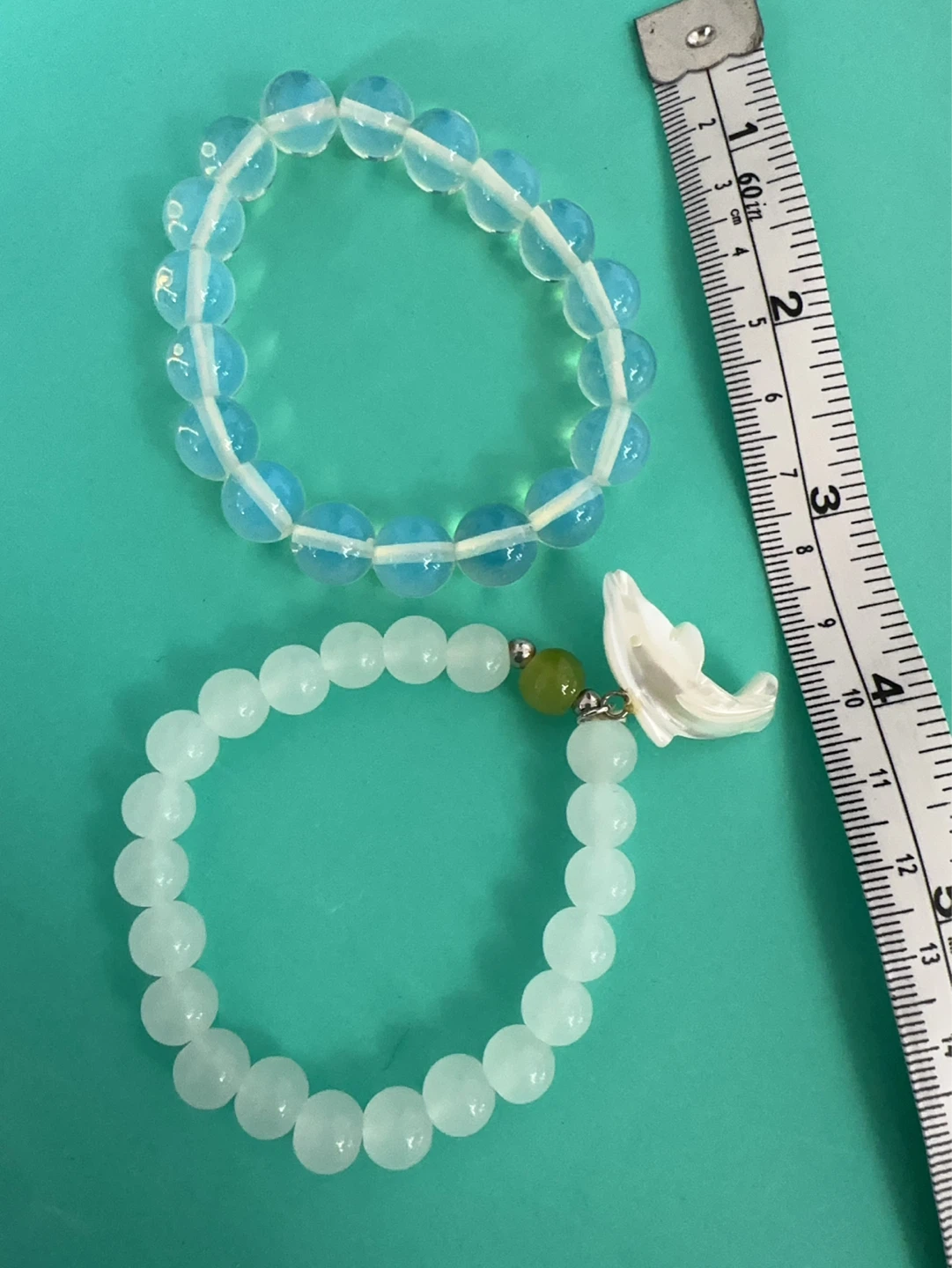 Beaded Bracelets with mother of pearl Dolphin Charm