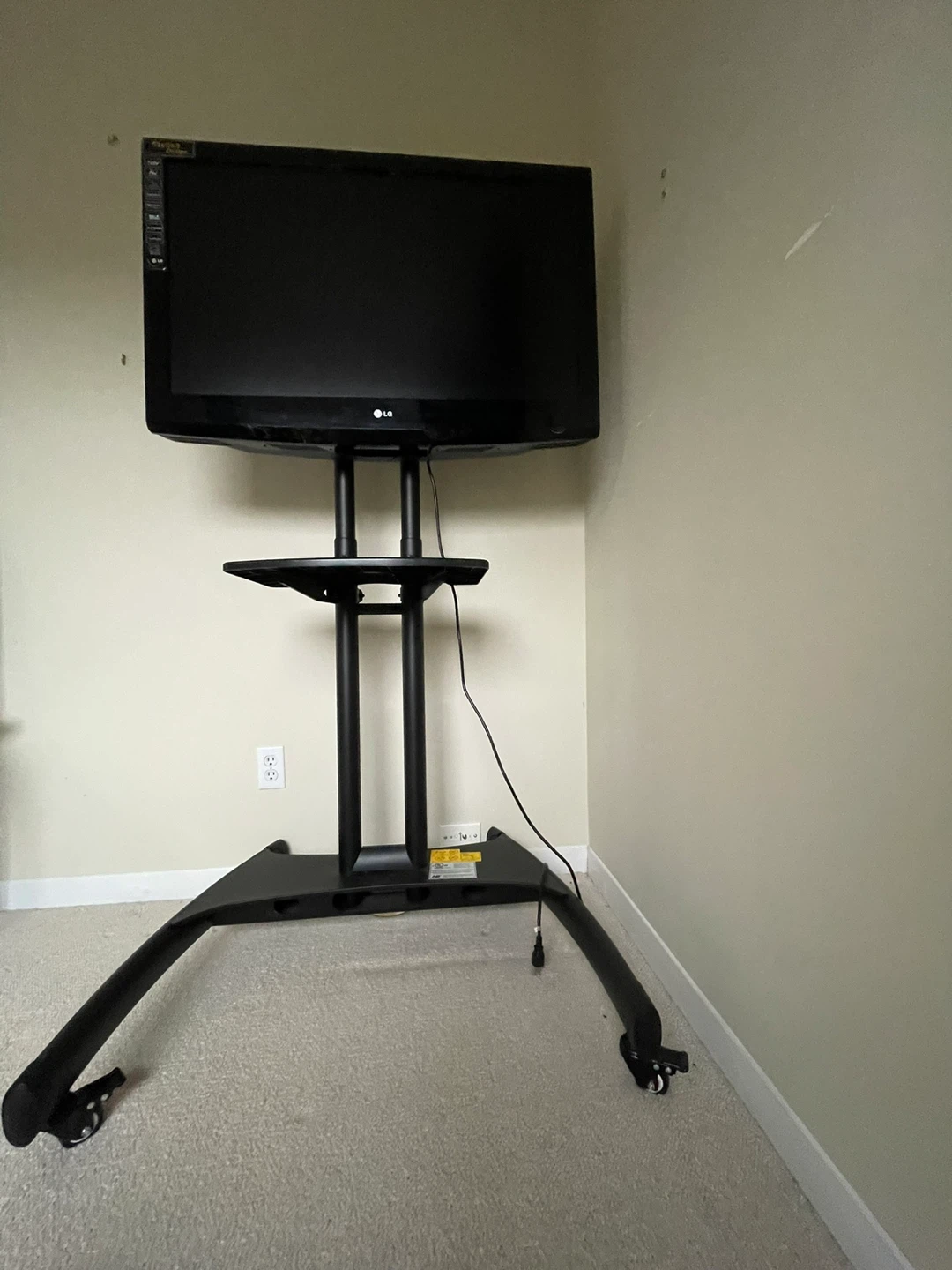 Black Rolling TV Stand with Shelf