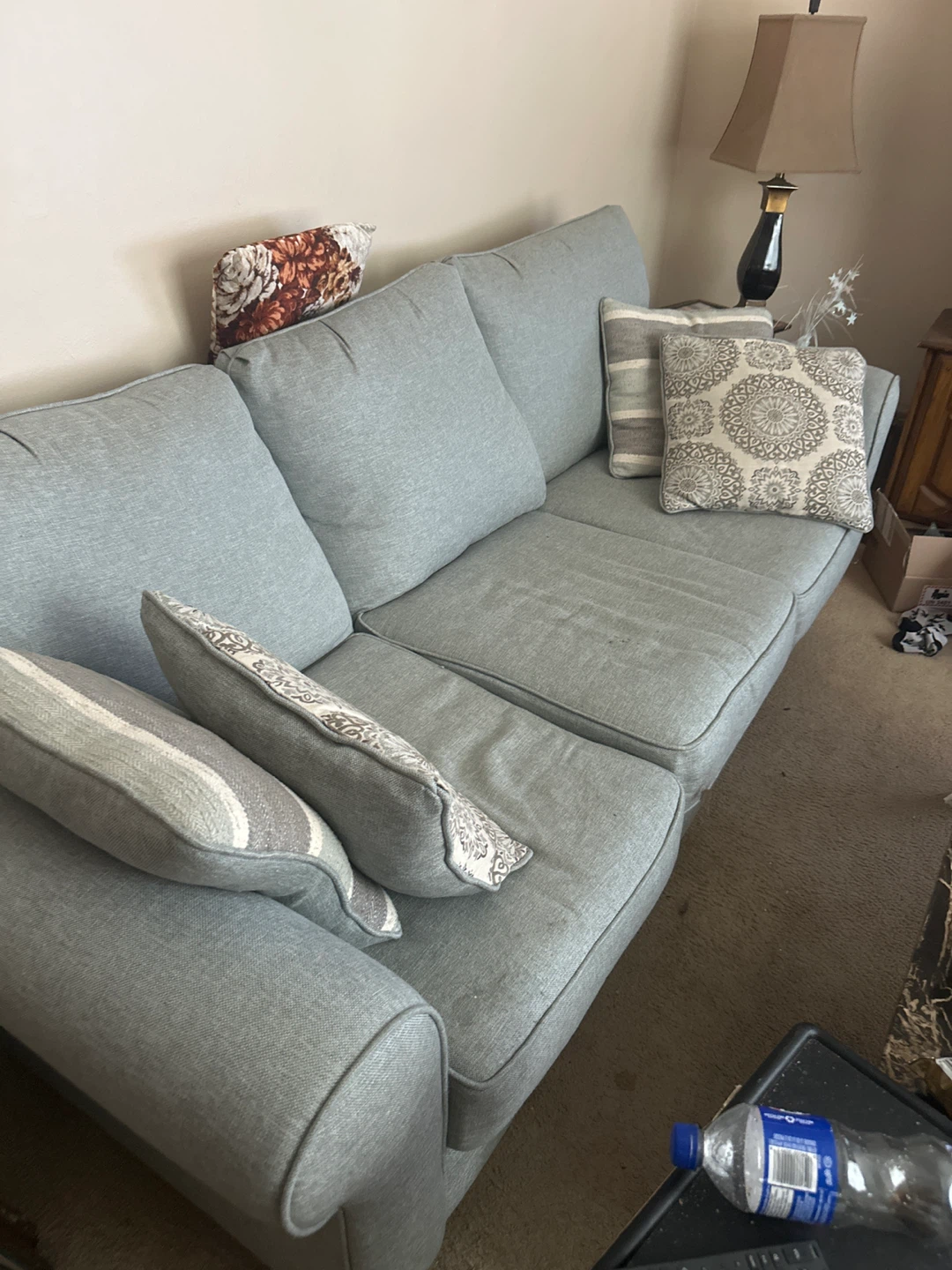 Light Blue Sectional Sofa with Throw Pillows