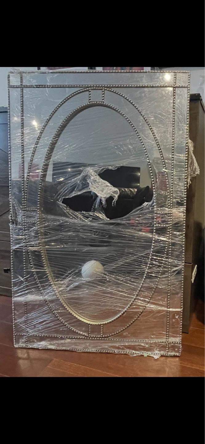 Decorative mirror excellent condition.  28x44.5 inches