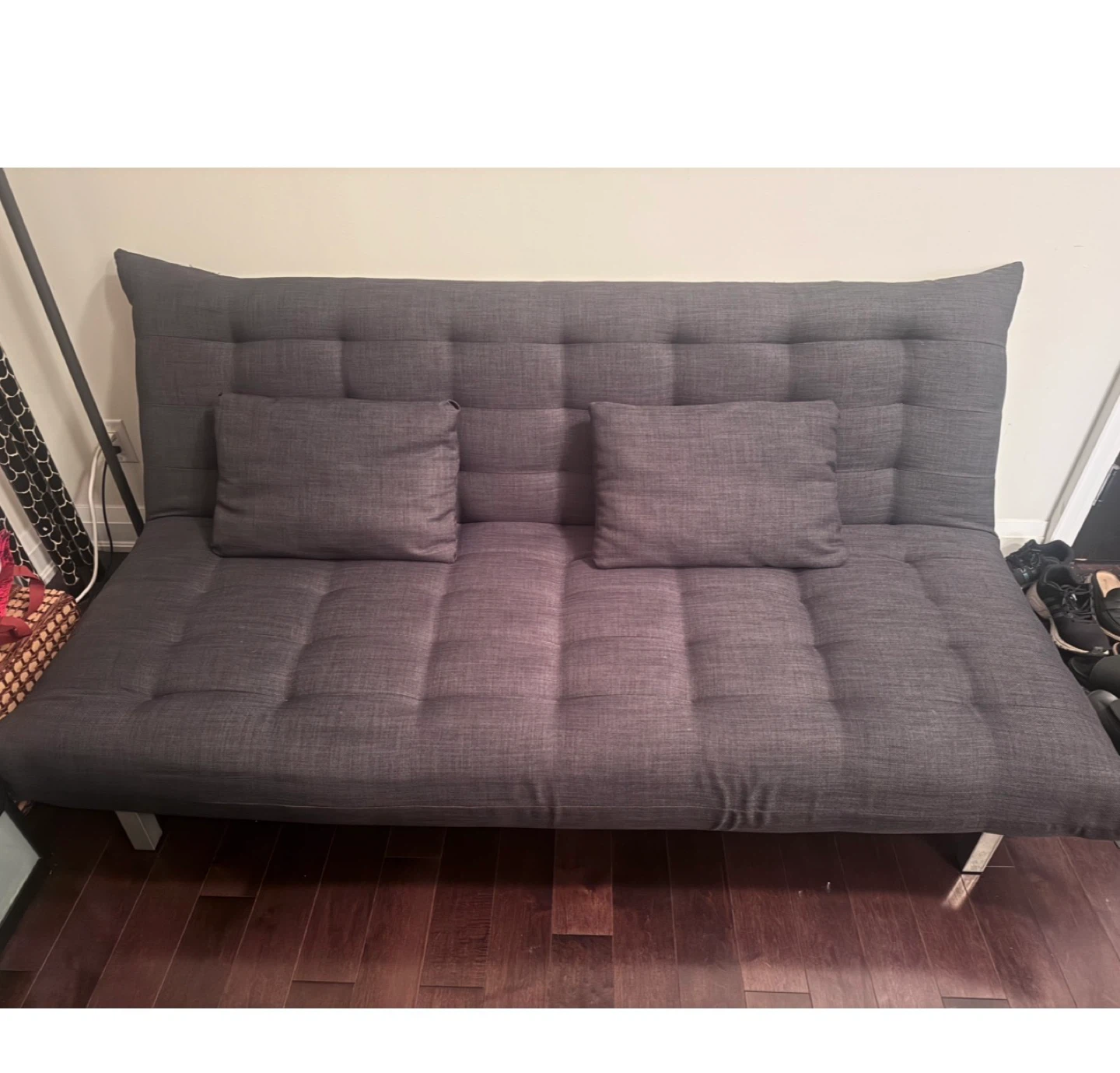 Grey Sofa Bed with Two Pillows
